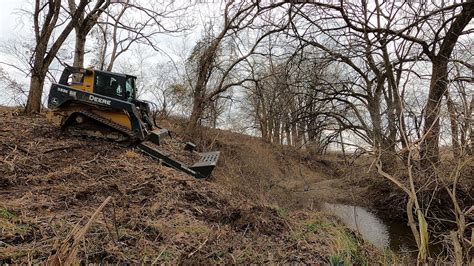 clearing trees with a skid steer|land clearing with a skid steer.